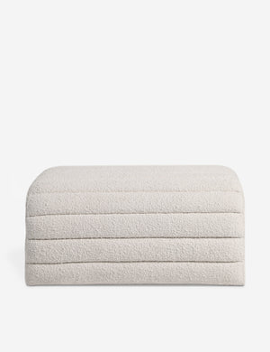 Side profile of the Leon textural boucle channel tufted waterfall ottoman by Carly Cushnie.