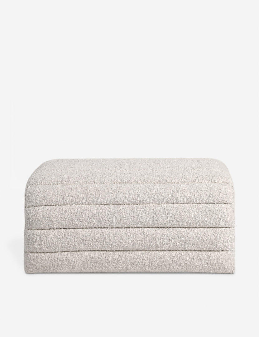 #color::ivory-boucle | Side profile of the Leon textural boucle channel tufted waterfall ottoman by Carly Cushnie.