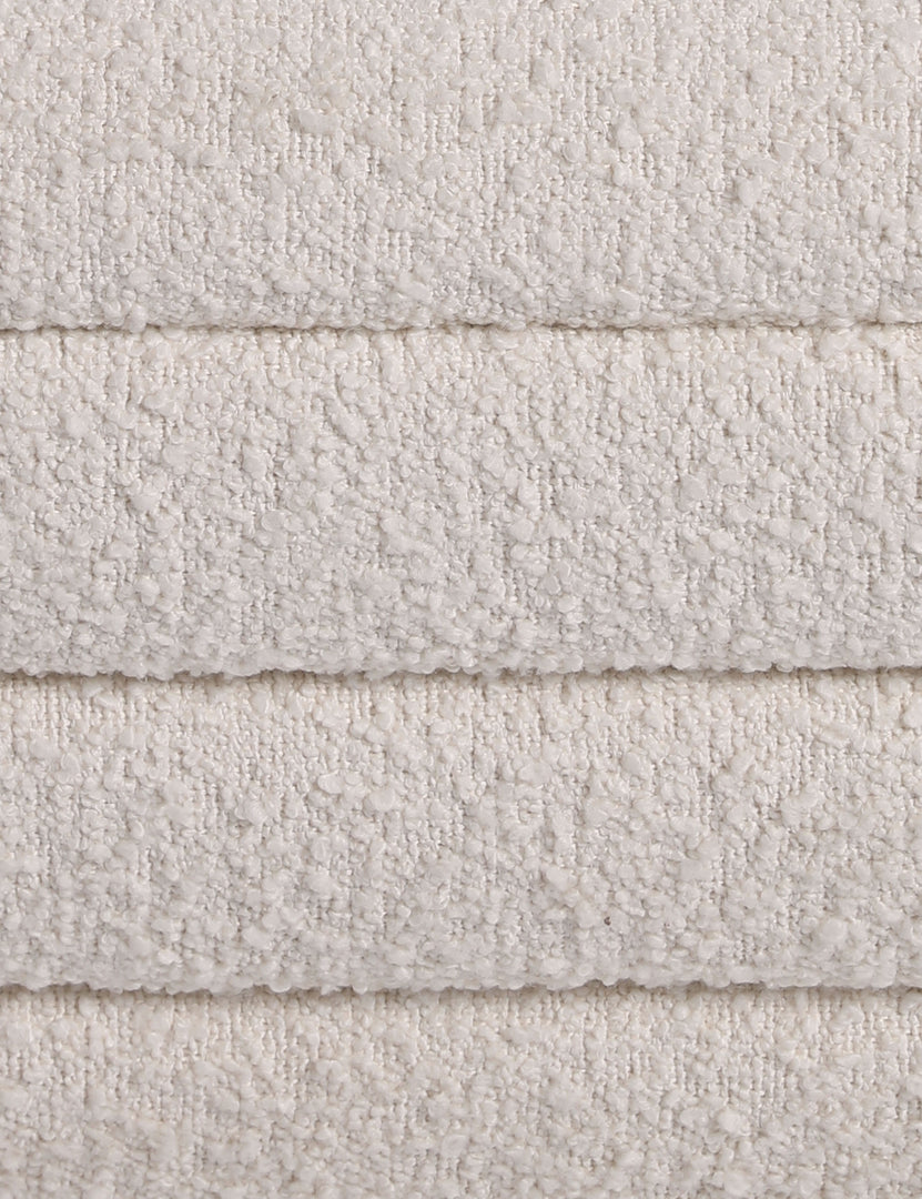 #color::ivory-boucle | Close up of the Leon textural boucle channel tufted waterfall ottoman by Carly Cushnie.