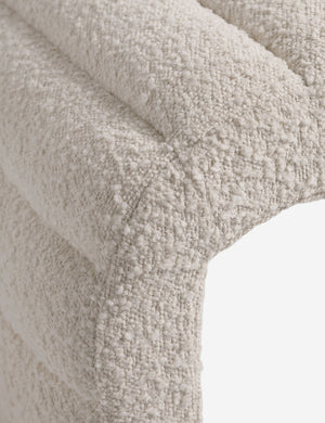 Close up of the Leon textural boucle channel tufted waterfall ottoman by Carly Cushnie.
