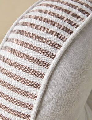 Close up of the Littu Indoor / Outdoor Striped Disc Pillow by Sarah Sherman Samuel in Brown