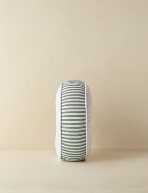 Side profile of the Littu Indoor / Outdoor Striped Disc Pillow by Sarah Sherman Samuel in Moss