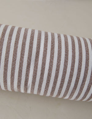 Close up of the Littu Indoor / Outdoor Striped Bolster Pillow by Sarah Sherman Samuel in Brown