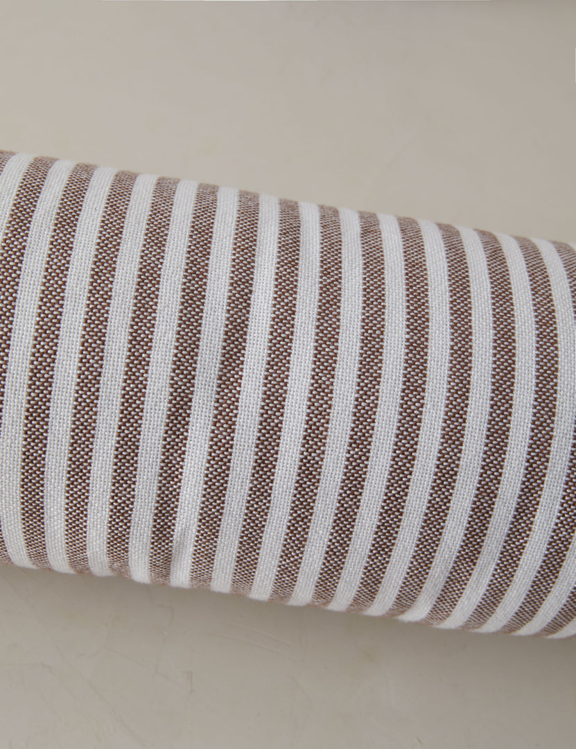 #color::brown | Close up of the Littu Indoor / Outdoor Striped Bolster Pillow by Sarah Sherman Samuel in Brown