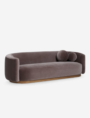 Angled view of the Lowry rounded silhouette velvet sofa.