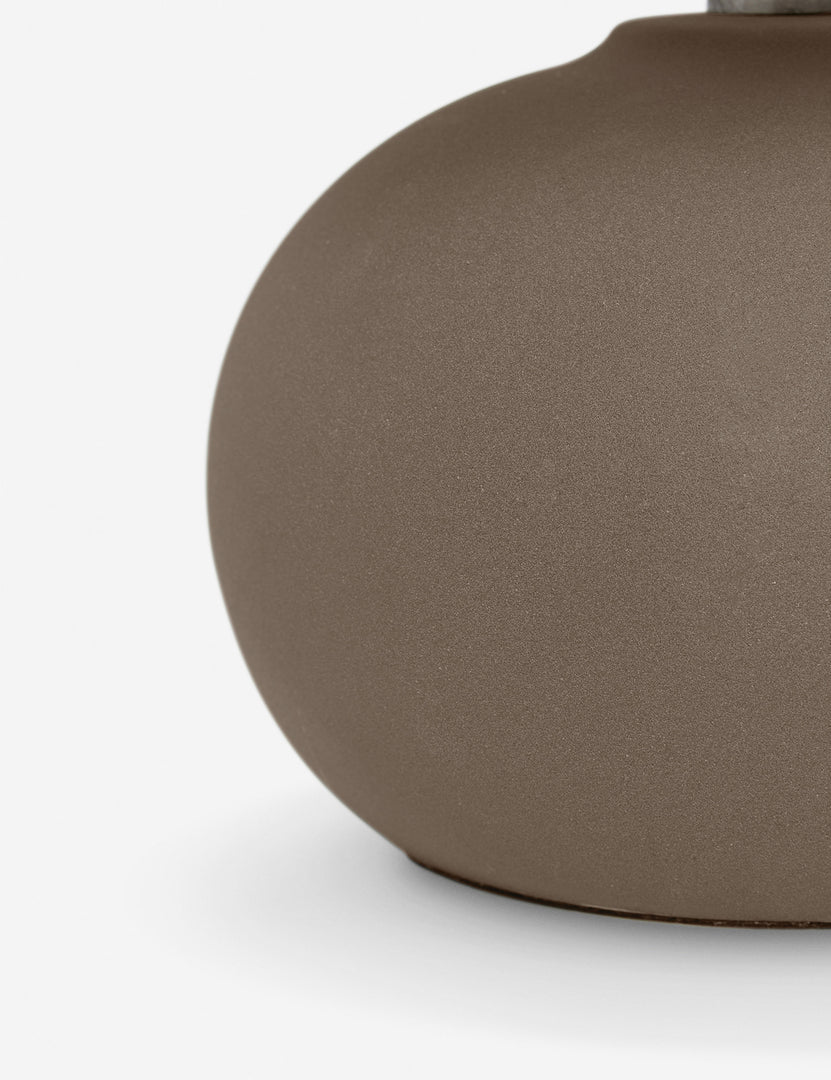 #size::mini #color::latte | Close up of the Luis round ceramic mini table lamp.