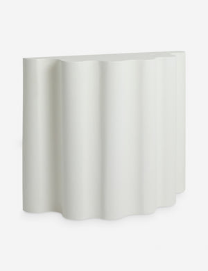 Angled view of the Lune half-moon, scalloped concrete console table