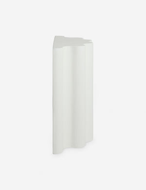 Side view of the Lune half-moon, scalloped concrete console table