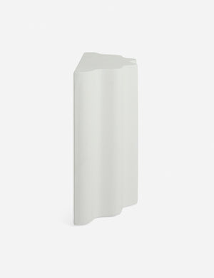 Side view of the Lune half-moon, scalloped concrete side table