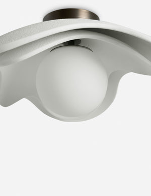Close up of the Soft Petal matte white floral silhouette flush mount light