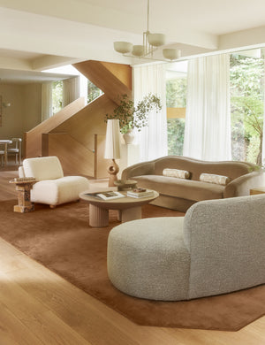 Living room featuring the Kya textural boucle armless accent chair.
