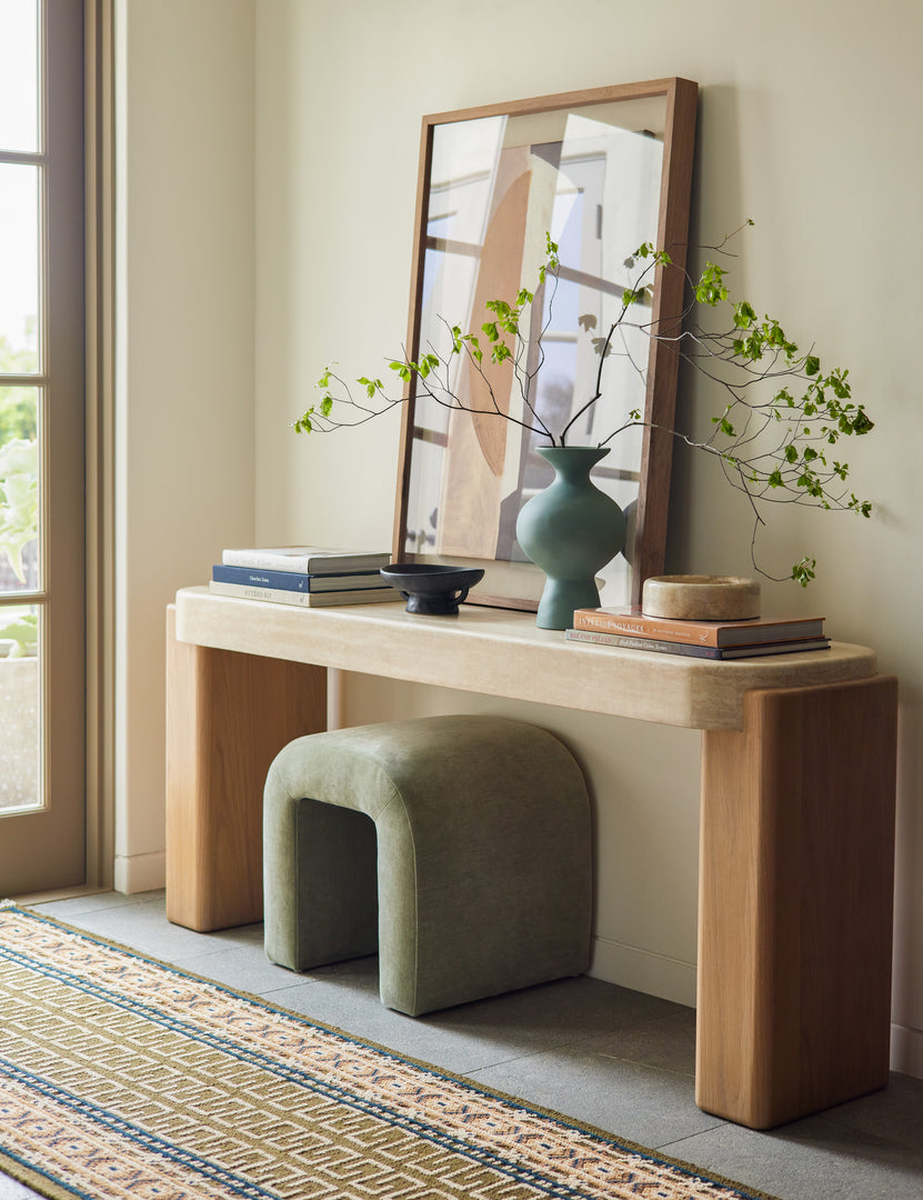 #color::ochre #size::2-6--x-8--runner | The Manca traditional geometric motif hand-knotted wool runner rug styled in front of a console table.