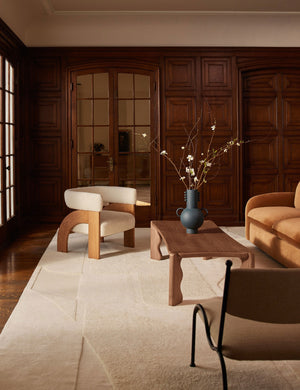 Living room featuring the Agacia barrel back boucle upholstered accent chair by Aimee Song