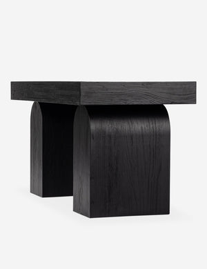 Mags sculptural solid wood desk in black.