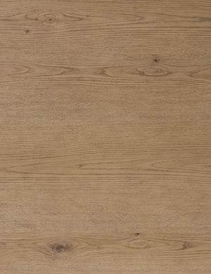 The wood grain details on the Friese oak extendable dining table.