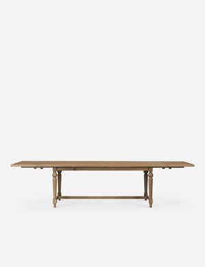 Front on view of the Friese oak extendable dining table.