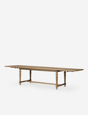 Angled view of the Friese oak extendable dining table.