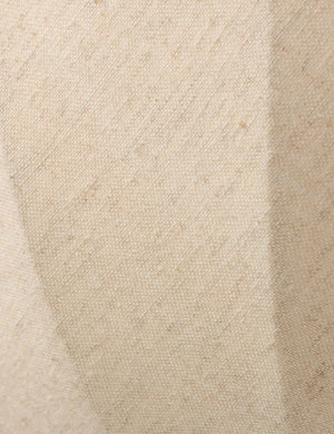 Close up of the Mahan linen up-ight wall sconce