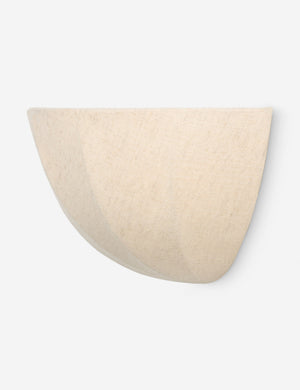 Angled view of the Mahan linen up-ight wall sconce