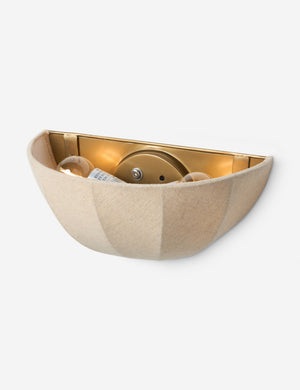Angled overhead view of the Mahan linen up-ight wall sconce