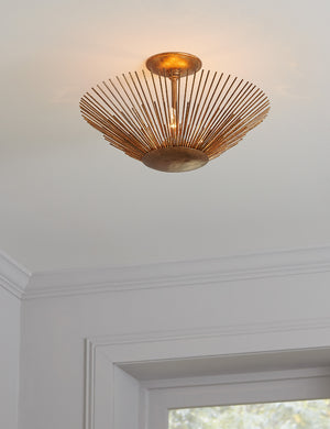 Maire starburst silhouette semi-flush mount light on a ceiling
