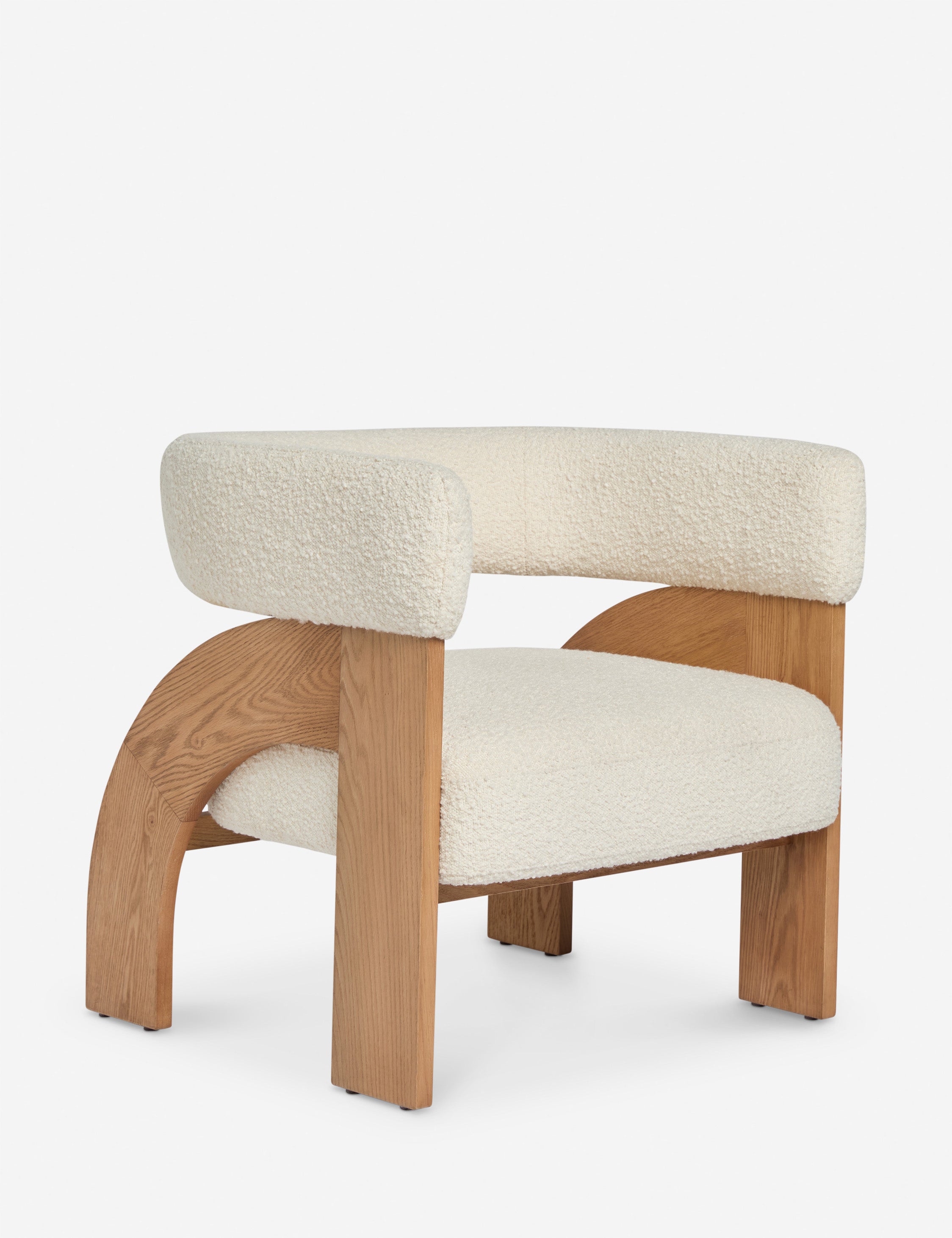 #color::ivory-boucle | Angled view of the Agacia barrel back boucle upholstered accent chair by Aimee Song