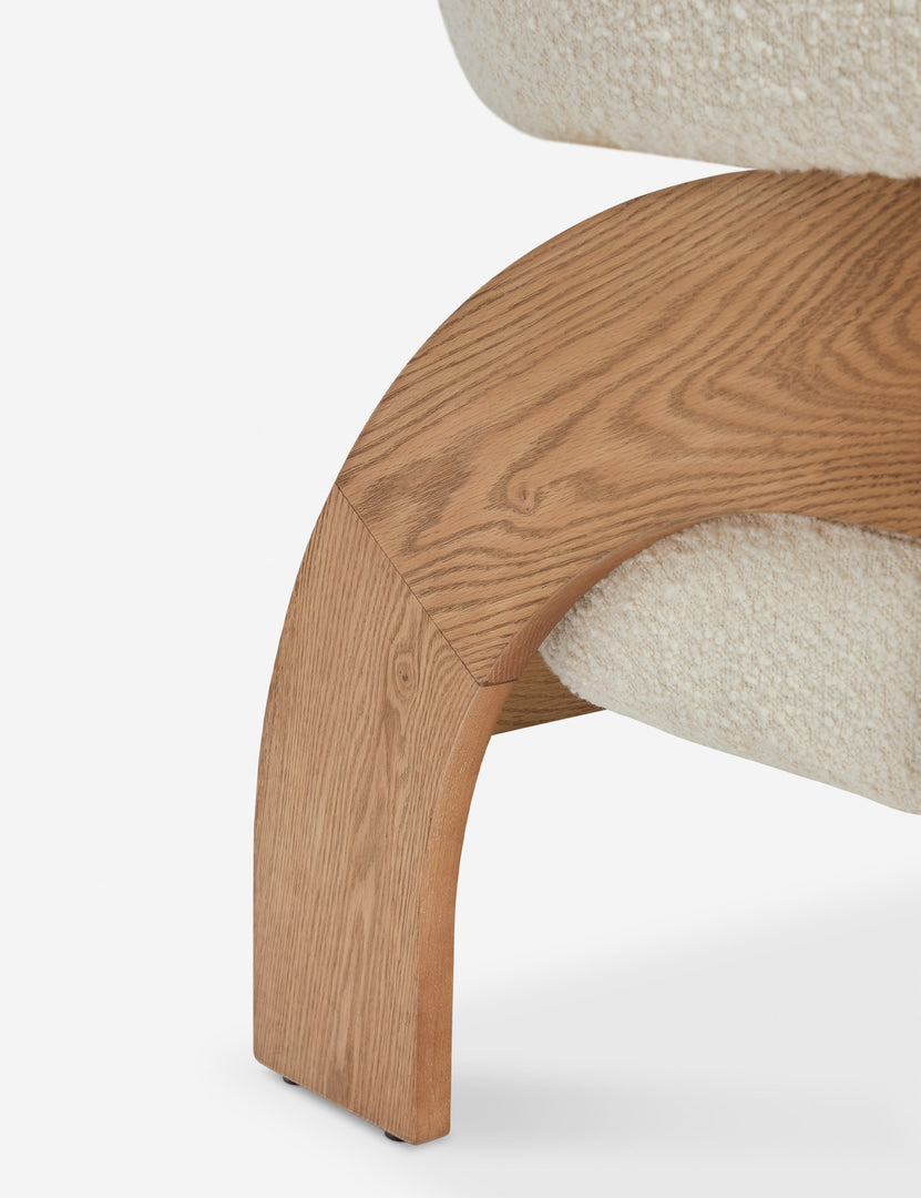 #color::ivory-boucle | Close up view of the Agacia barrel back boucle upholstered accent chair by Aimee Song