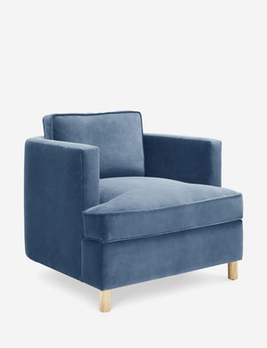 Angled view of the Belmont Harbor blue velvet accent chair