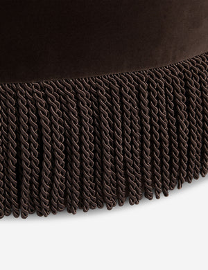 Close up view of the fringe of the Brahm sculptural velvet fringe accent stool by Aimee Song