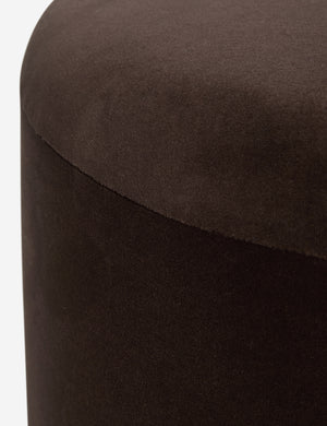 Close up view of the Brahm sculptural velvet fringe accent stool by Aimee Song