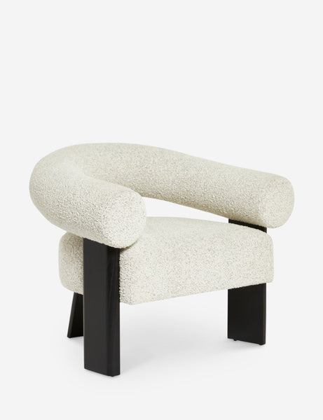 #color::black | Angled view of the Celeste black wood accent chair with wishbone frame