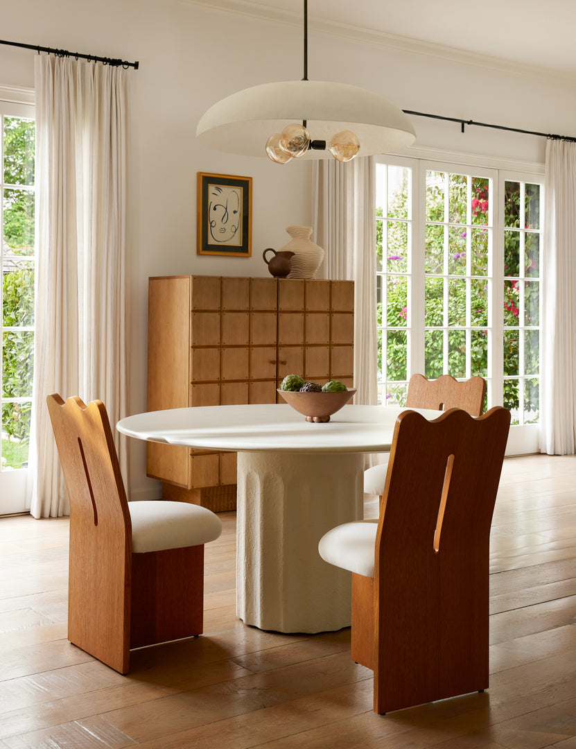 #color::honey-oak | Three Ripple tall, wavy back wooden dining chair around a dining table