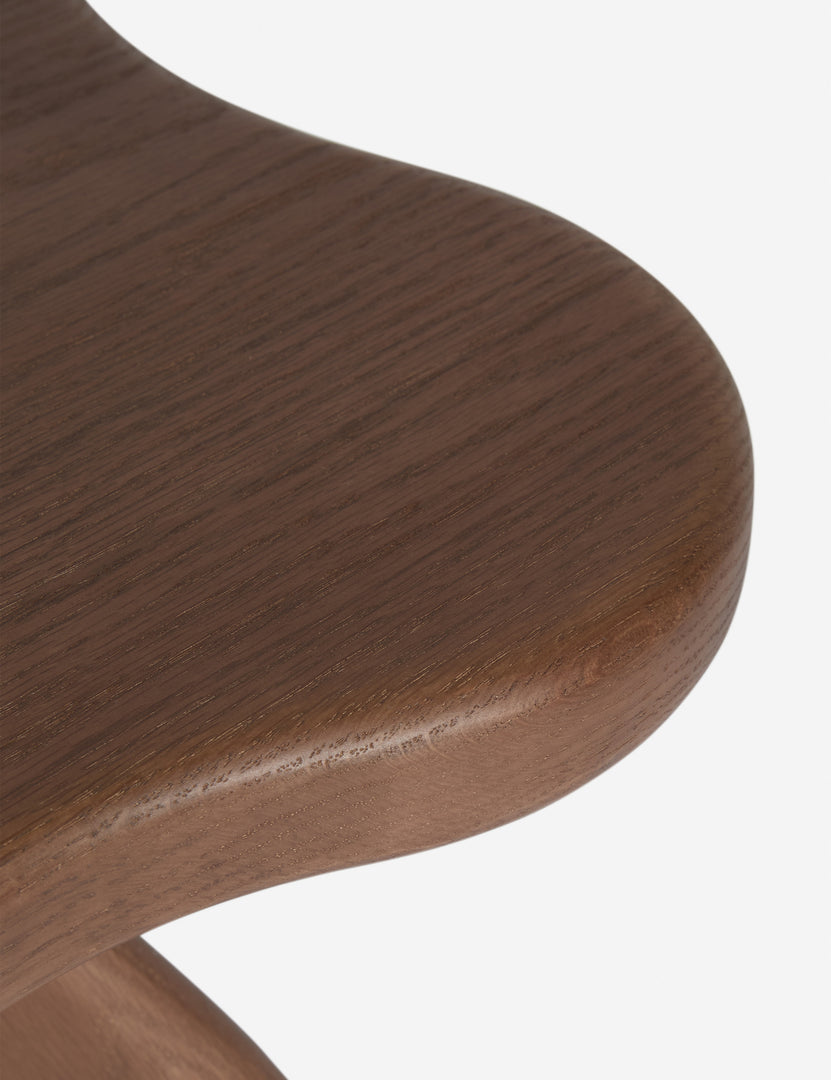 #color::cool-brown | Close up view of the Etna sculptural modern wood accent stool by Aimee Song