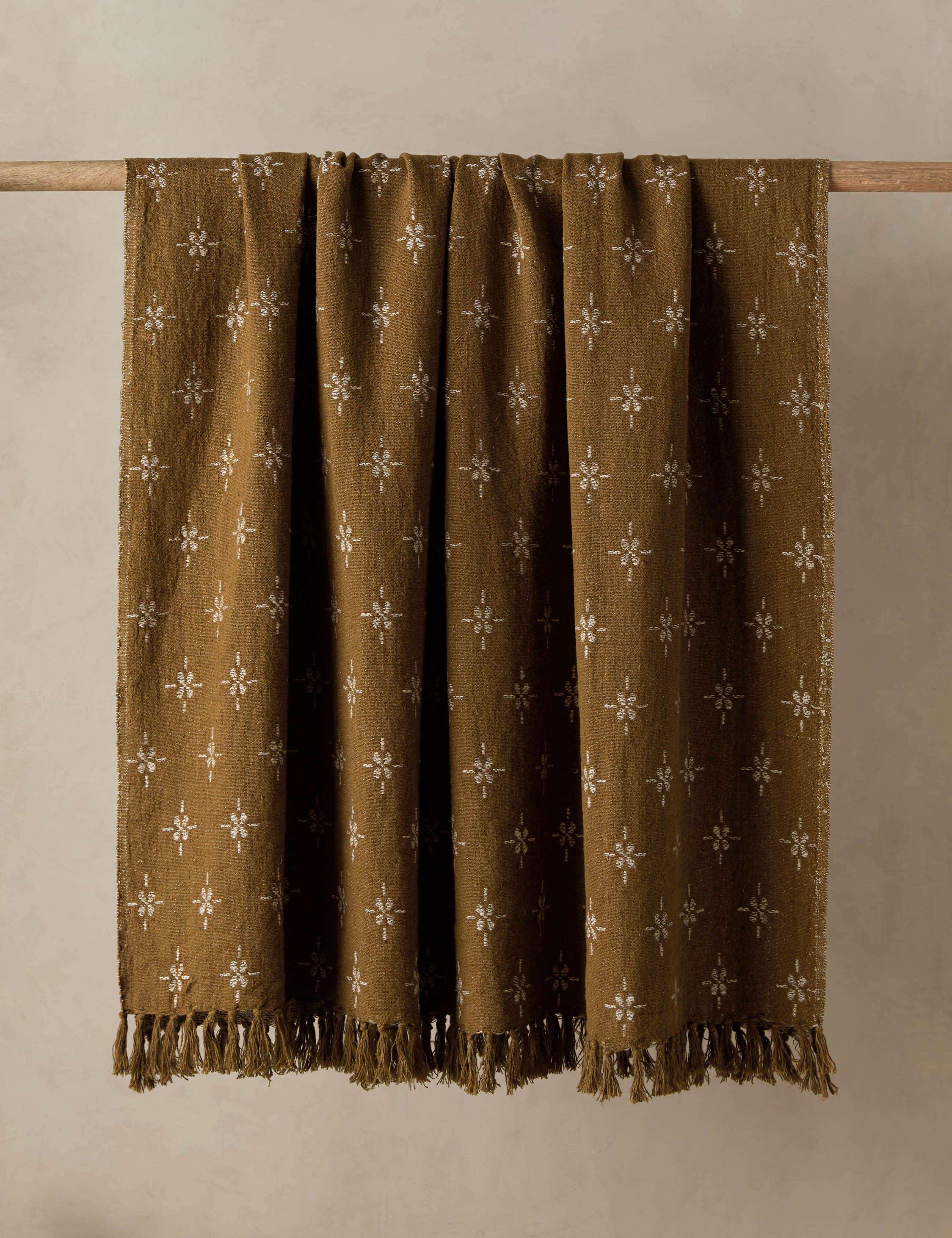 #color::marigold-and-ivory | The Fania lightweight linen-cotton blend floral motif throw.