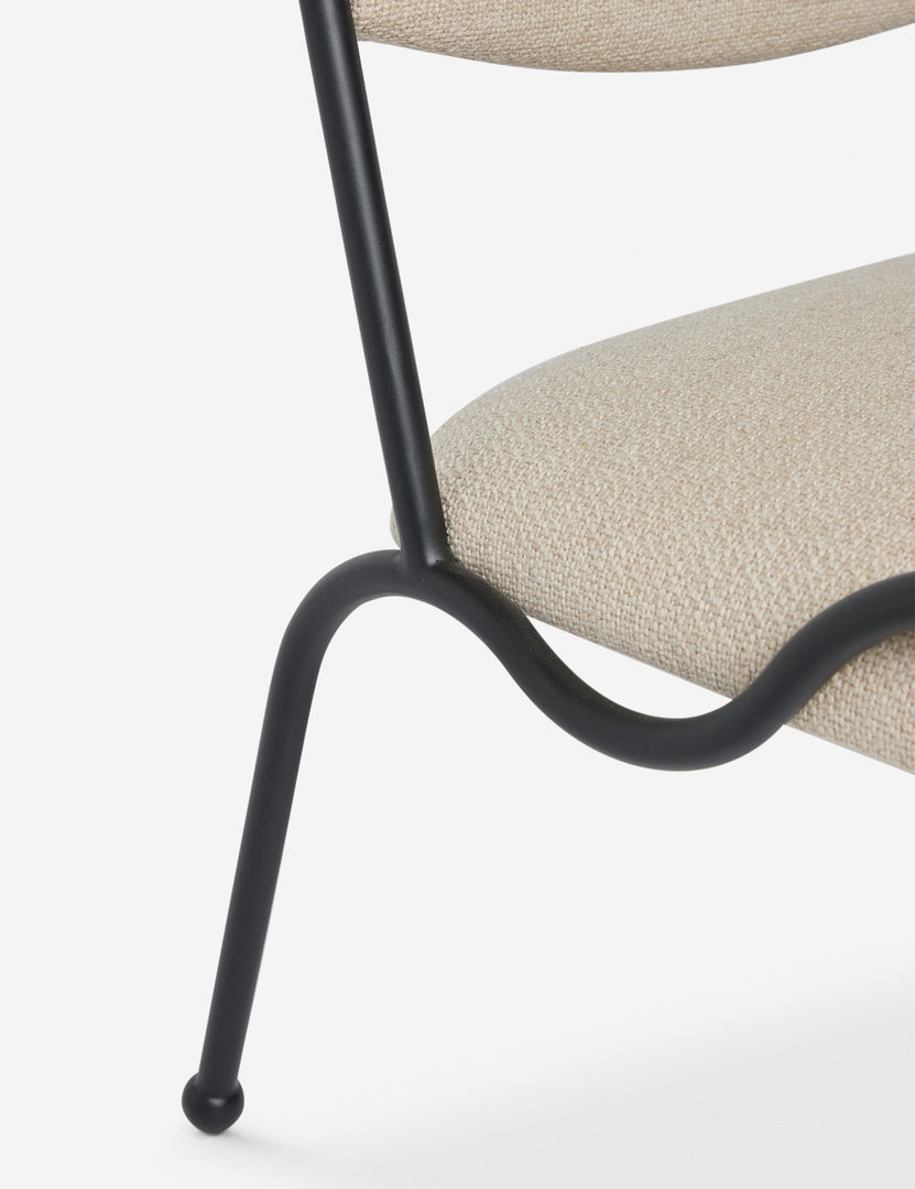 #color::taupe-basketweave | Close up view of the Fidia curved metal silhouette accent chair by Aimee Song