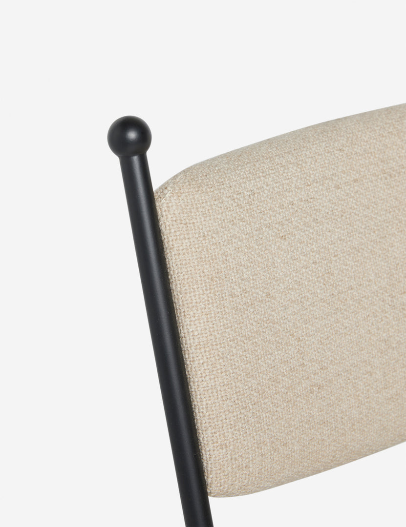 #color::taupe-basketweave | Close up view of the Fidia curved metal silhouette accent chair by Aimee Song