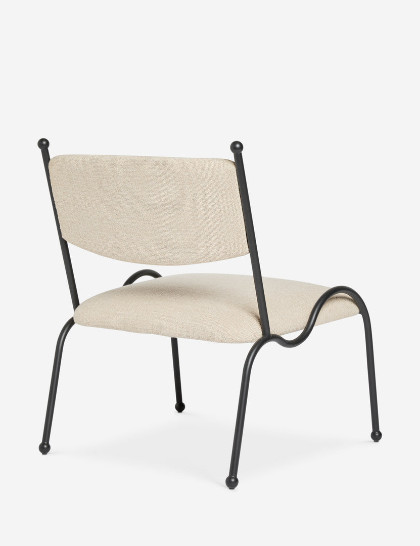 #color::taupe-basketweave | Angled back view of the Fidia curved metal silhouette accent chair by Aimee Song