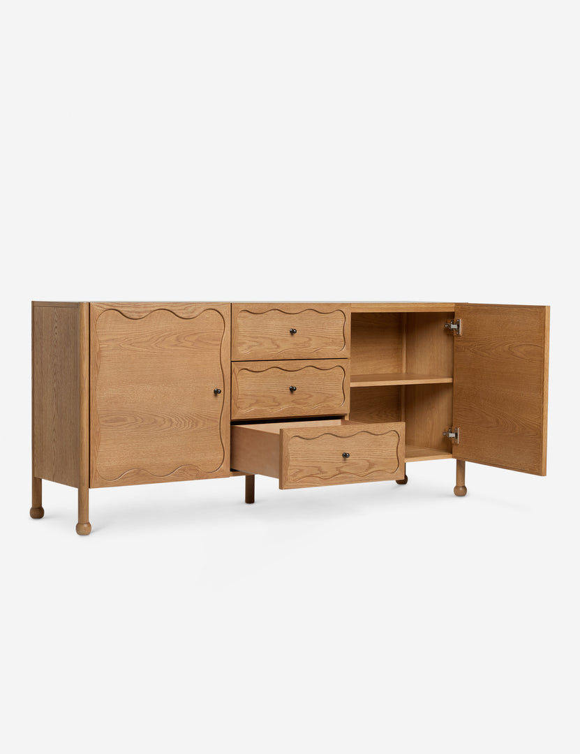 #color::natural | Fontaine wavy detailing solid oak sideboard by Aimee Song with one door and one drawer open