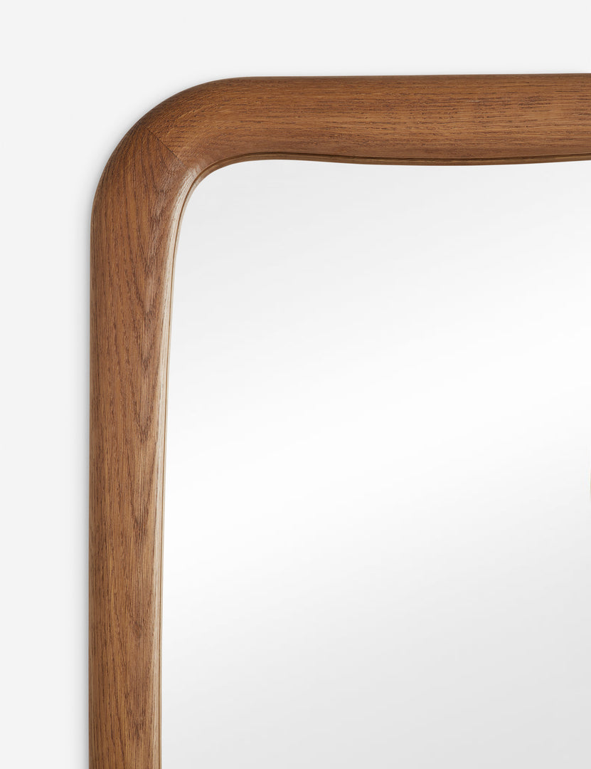 #color::natural | Close up view of the frame of the Galilea solid wavy wood frame floor mirror mirror by Aimee Song