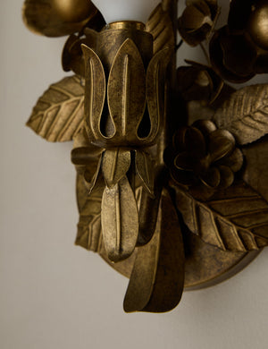 Close up of the Garda ornate floral metalwork wall sconce by Heidi Caillier