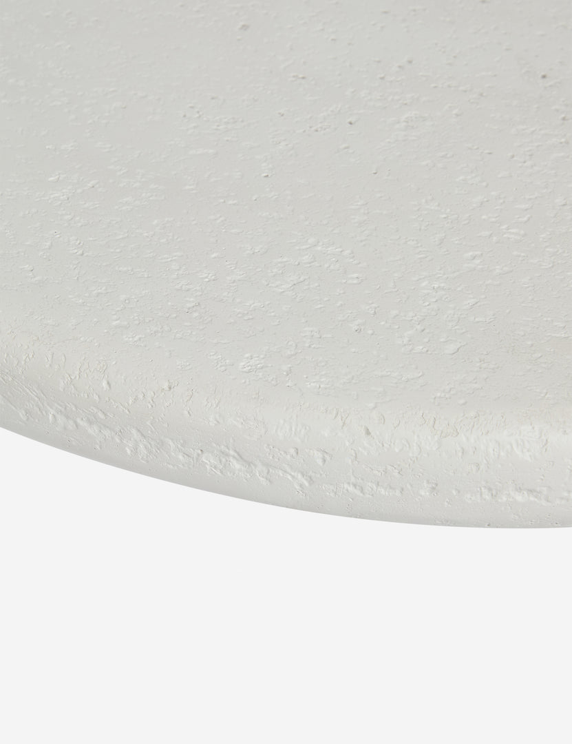 #color::ivory | Close up view of the Hannu modern round fibercement coffee table by Aimee Song