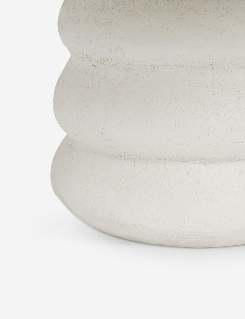#color::ivory | Close up view of the Hannu modern round fibercement dining table by Aimee Song