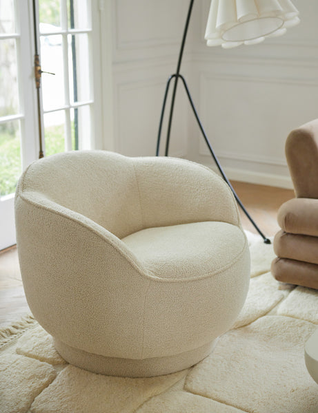 #color::teddy-boucle | Fern scalloped back boucle upholstered swivel chair styled next to the Addie floor lamp