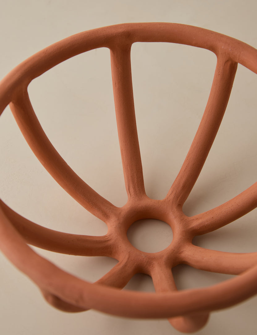 #color::terracotta #size::large | Close-up of the center and side of the Prong terracotta ceramic centerpiece bowl by SIN