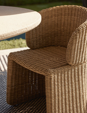 Mettam modern wicker outdoor dining chair.
