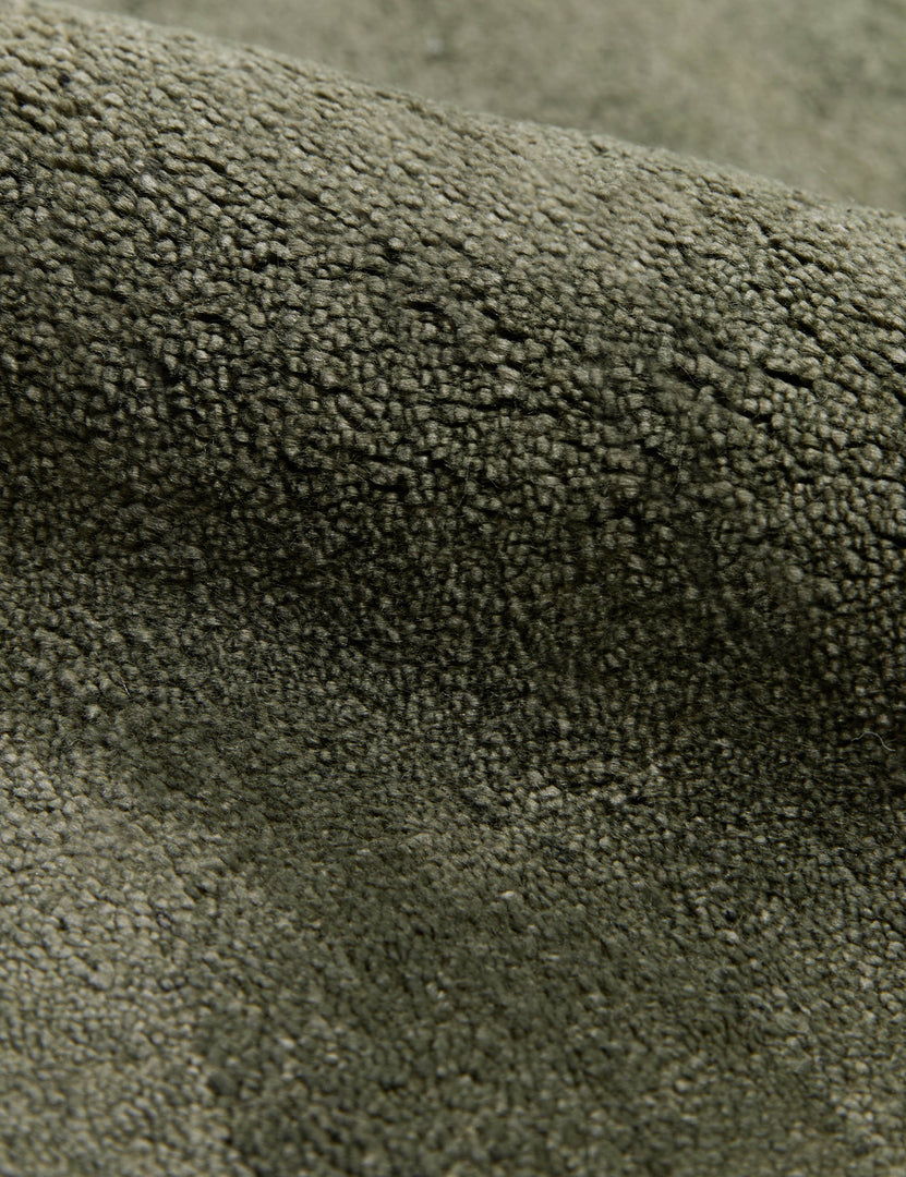 #color::deep-sage #size::2-6--x-8--runner #size::3--x-5- #size::4--x-6- #size::5--x-8- #size::6--x-9- #size::8--x-10- #size::9--x-12- #size::10--x-14- #size::12--x-15- | Close up view of the Sutton Solid Color Hand-Loomed Viscose Rug by Aimee Song