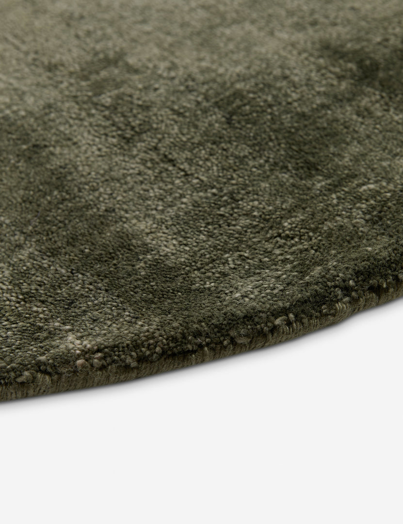 #color::deep-sage #size::2-6--x-8--runner #size::3--x-5- #size::4--x-6- #size::5--x-8- #size::6--x-9- #size::8--x-10- #size::9--x-12- #size::10--x-14- #size::12--x-15- | Close up view of the Sutton Solid Color Hand-Loomed Viscose Rug by Aimee Song