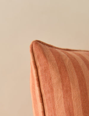 Close up view of the corner of the Welby striped tufted button linen throw pillow by Aimee Song