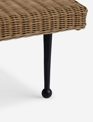 Close up of the leg of the Marisol sculptural wicker outdoor chaise by Sarah Sherman Samuel.