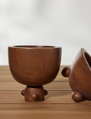 Close up view of the set of three mini footed walnut bowls by Sarah Sherman Samuel